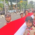 Semarak Nasionalisme di Karnaval Paskah Semarang 2026: Bendera Merah Putih 100 Meter Menghiasi Jalan Kota